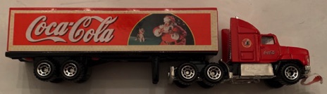 10346-1 € 5,00 coca cola vrachtwagen kerstman met hond ca 18 cm.jpeg